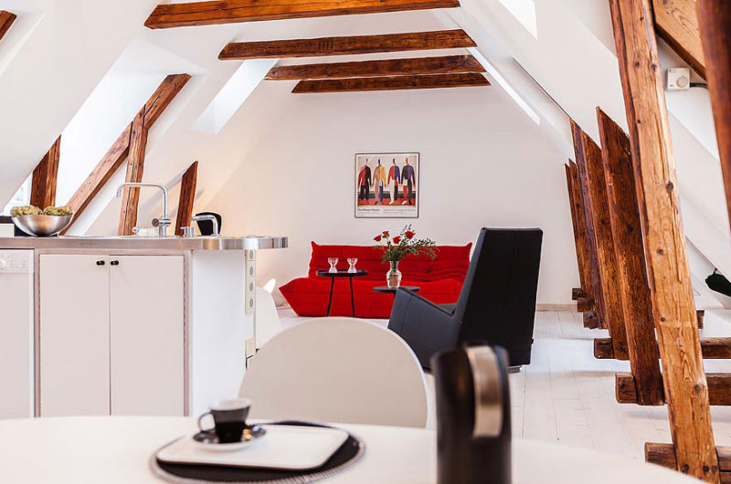 Modern Attic with a View of the Rooftops modern attic with a view of the rooftops f2c3fa8