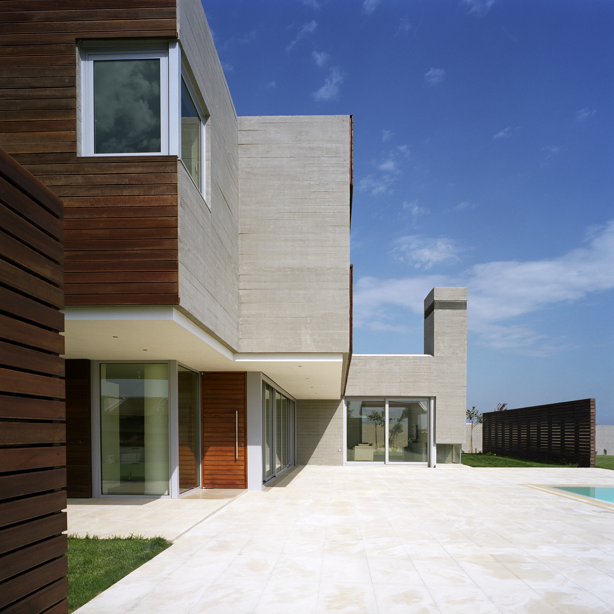 L-Shaped Residence in Larissa by Potiropoulos D+L Architects l shaped residence in larissa by potiropoulos dl architects a0e4874