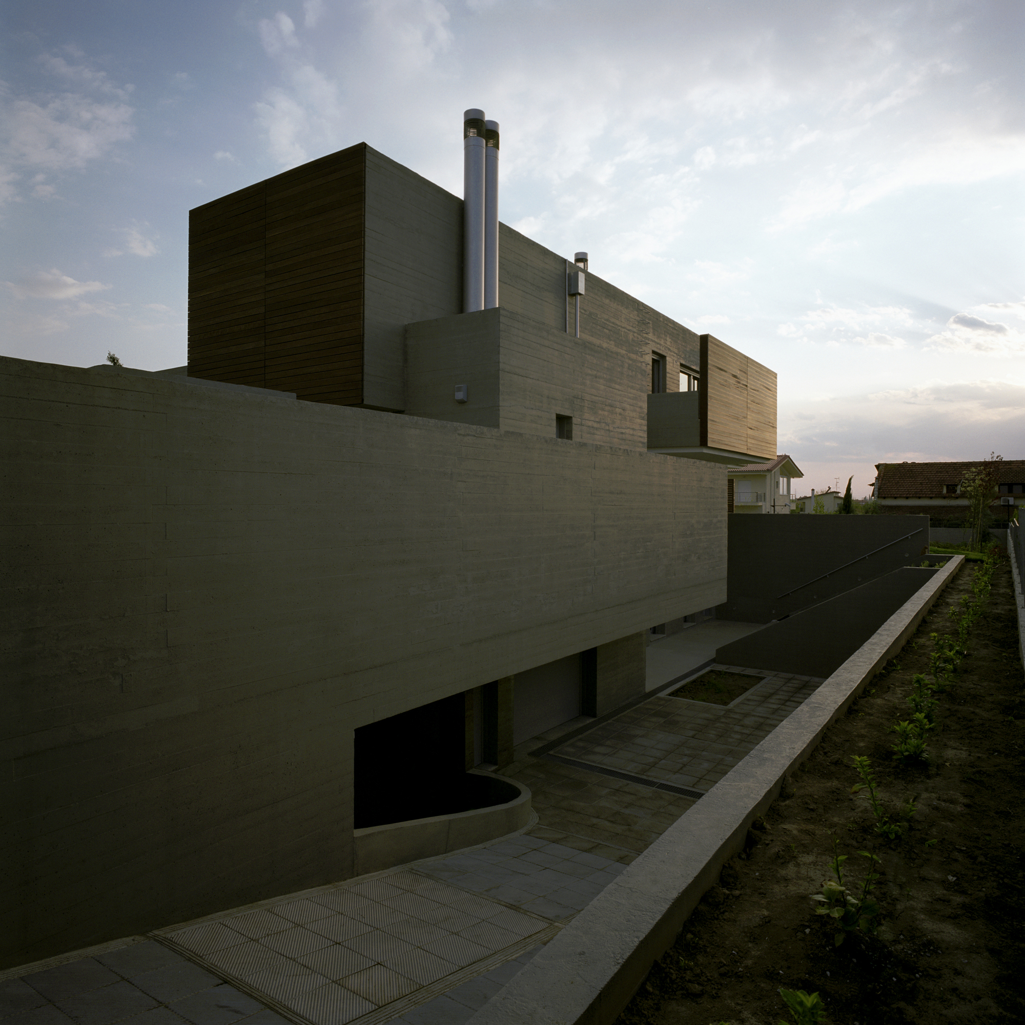 L-Shaped Residence in Larissa by Potiropoulos D+L Architects l shaped residence in larissa by potiropoulos dl architects b547061