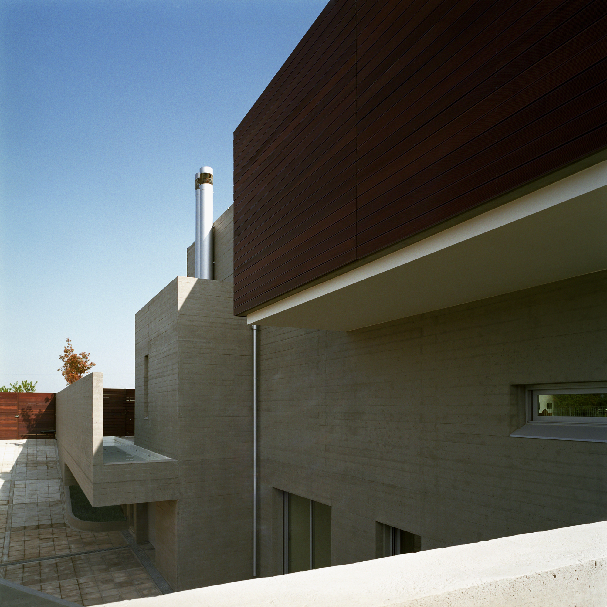 L-Shaped Residence in Larissa by Potiropoulos D+L Architects l shaped residence in larissa by potiropoulos dl architects cd229a0