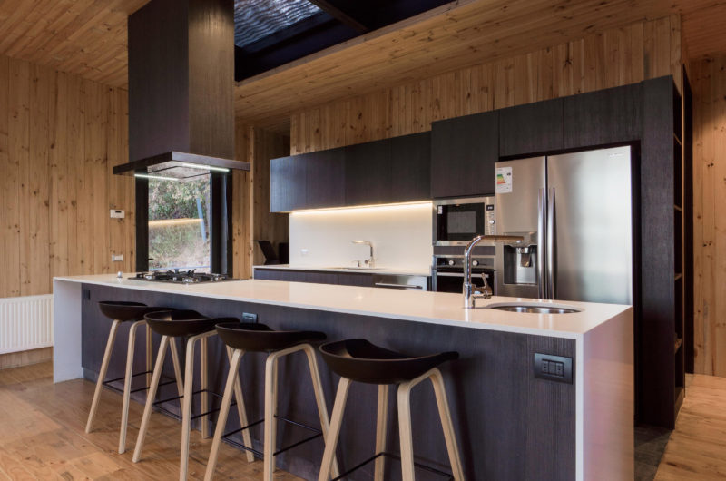 Wooden house by Hsü Rudolphy peeps from trees near Chilean lake wooden house by hs rudolphy peeps from trees near chilean lake 0754b0f