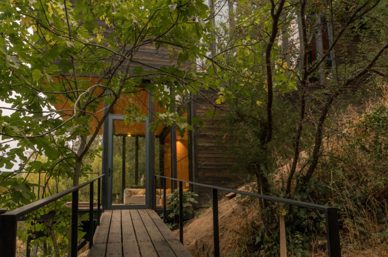 Wooden house by Hsü Rudolphy peeps from trees near Chilean lake wooden house by hs rudolphy peeps from trees near chilean lake 32d294a